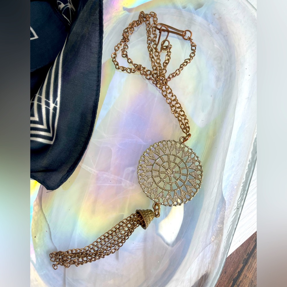 Gold bell charm necklace